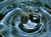 Circular ripples spreading across water