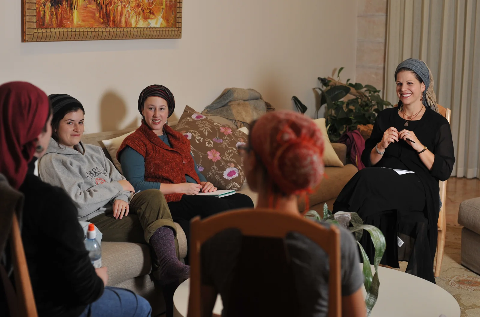 Women seated together in a discussion group